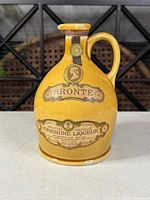 Front view showing Bronte label and overall jug form