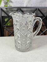 full view left side of cut glass pitcher