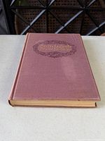 Front cover showing title design, cloth texture and page edges