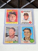 Fronts of all four sleeved cards