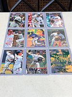 3x3 layout of all nine sleeved cards