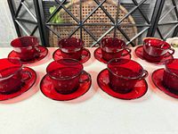 Full set of 8 cups with saucers displayed