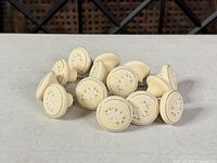 All 14 knobs arranged in circle, top view