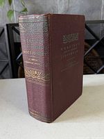 Spine and front cover showing cloth texture and gilt stamping
