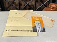 Overview of all three paper items: letterhead, envelope, brochure