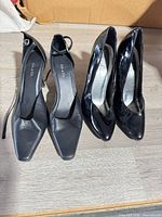 Both pairs of heels side by side