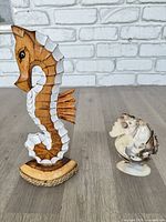 Both seahorse decorations side by side