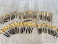 Entire flatware set laid out showing all pieces