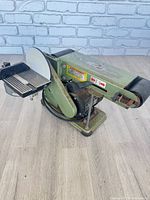 Full view of belt and disc sander showing overall form and condition
