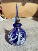 full view of perfume bottle with stopper