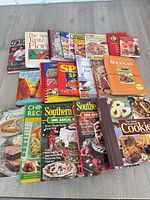 Group shot of all cookbooks spread on floor