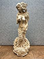 Full view of 30 in tall mermaid statue showing overall form and shell tail