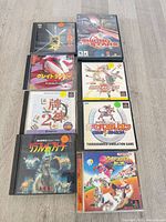 All eight game cases front view