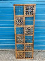 full view of rectangular wood and iron panel