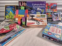 Group shot of kits, books, blocks and game