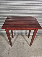 Full view of rectangular mahogany veneer side table