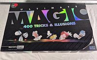 Front of holographic Ultimate Magic box