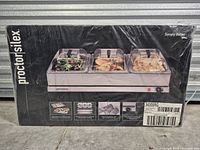 Front of retail box displaying Proctor Silex buffet server and branding