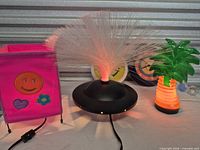 All items grouped, fiber optic and palm tree lamps illuminated