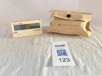 Both items together: Junghans Mega clock and Japan Air Lines pouch