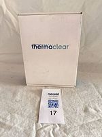 Front view of closed white Thermaclear retail box