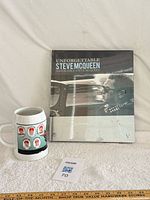 Overall lot with book and stein for scale