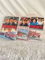 Front view of all three sealed season DVD cases