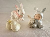 All three porcelain figurines grouped together