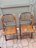 Front view pair of bamboo rattan chairs