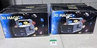 Two original Chauvet 3D Magic boxes side by side