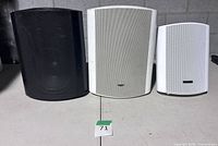 Front view of all three Tortech speakers showing grille condition and size differences