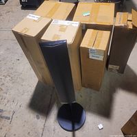 Six boxed Sony SS-TS95 speakers with one assembled on stand