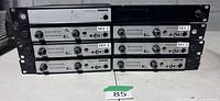 Front view of stacked Shure P7T transmitters and antenna combiner