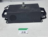 Front view of oscillating base showing vent, mounting flanges and top stud