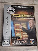 Front of boxed Deal or No Deal interactive DVD game