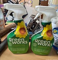 Front view showing both Green Works cleaner bottles unopened