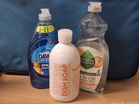 Front view of all three unopened dish soap bottles