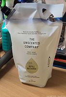 Front of The Unscented Company 2 L body soap refill pouch showing branding and capacity