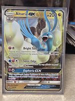 Front view of Altaria GX Dragon Majesty card in sleeve