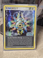 Front of card in sleeve showing reverse holo pattern and set logo