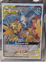 Front of Moltres & Zapdos & Articuno GX card in sleeve