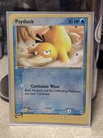 Front of Psyduck card in sleeve and toploader