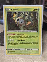 Front view of Rowlet McDonald's holo card in sleeve