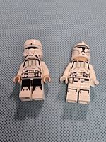 Front view of both Clone Trooper minifigures with helmets on