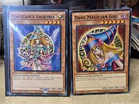Front view of both cards showing titles, artwork, stats, 1st Edition markings