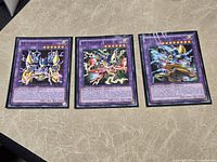 Fronts of the three 1st Edition Fusion cards