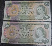 Two Canadian $20 bills, full view front sides