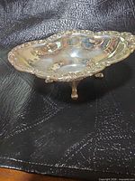 Top view of sterling compote showing ornate rim and interior