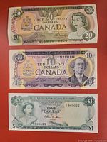 Obverse views of the three banknotes