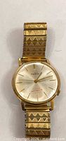 Front view of Ruhla gold-tone wristwatch with stretch band
